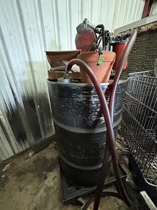 Oil Drum with Fill-Rite Division Series Rotary Hand Pump 