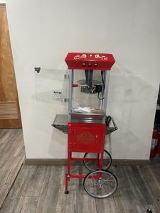 POP CORN MACHINE - *** BRAND NEW *** POP CORN MACHINE ON CART. 8 OZ CAPACITY. MAKES ABOUT 48 CUPS PER BATCH. STYLISH DESIGN ON CART THAT MAKES IT EASY TO TRANSPORT TO ANY EVENT. GREAT FOR PARTIES.