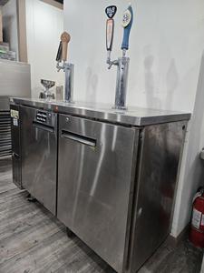 DRAFT BEER COOLER - STAINLESS STEEL DRAFT BEER COOLER. 2 DOORS. 2 TOWERS WITH 4 FAUCETS TO DISPENSER YOUR FAVORITE BEER ON TAP. GETS NICE AND COLD. RETAIL $1600.00