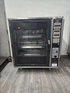 ROTISSERIE - HENNY PENNY ROTISSERIE MODEL SCR-6. CROSS FLOW CONVECTION PLUS RADIANT HEAT FOR PERFECT FOOD EVERYTIME. ROSTISSERIE CHICKEN, RIBS, CASSEROLES AND EVEN PASTRIES. ELECTRIC.COST NEW $4000.00