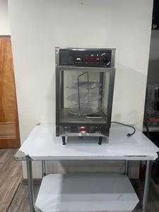 PIZZA DISPLAY - HEATED PIZZA DISPLAY AND WARMER. ROTATING CAROUSEL TO DISPLAY THE PIZZA. TEMPERATURE KNOB FOR ADJUSTED HEAT. GREAT TO DISPLAY ON A COUNTERTOP  RETAIL $ 1300.00