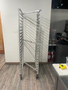 ROLLER RACK - ALUMINUM HEAVY DUTY BAKERS RACK. 20 SLOTS TO HOLD SHEET PANS. FULL SIZE AND HALF SIZE PANS. GREAT FOR MANY USES. COST NEW $350.00