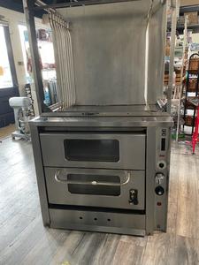 CONVECTION OVEN - MONTAGUE HEAVY DUTY COVECTION OVEN. VERTICAL OPENING DOORS. 5 PAN CAPACITY. COOK, ROAST, AND BAKE IN HALF THE TIME. GREAT TO HAVE IN ANY KITHCEN. RETAIL $14,000.00