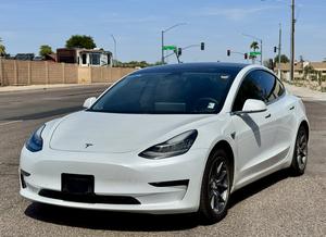 2020 Tesla Model 3 4 Door Sedan - Sold at AuctionAZ for $17,250