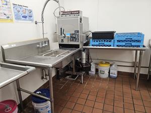 CMA Energy Mizer model EC-2 corner dishwasher with entry table that has sink and sprayer and exit table - Sold at AuctionAZ for $1,047