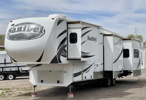 2013 Prime Time Sanibel 3400 by Forest River 5th Wheel Travel Trailer with Four Slide Outs Reserve- - Sold at AuctionAZ for $25,500