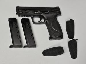 Smith & Wesson M&P 40 .40 cal. pistol SN# NKW9083 with box, 3 magazines and extra grips - Sold at AuctionAZ for $441