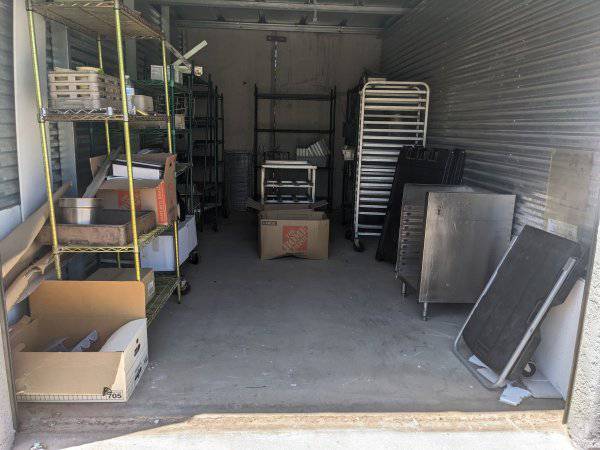 Contents of Storage Unit Including, Wire Storage Racks, Speed Rack,  Rubbermaid Cart, A-Frames, & Much More Auction