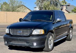 2001 Ford F-150 Harley-Davidson 4 Door Crewcab Pickup Truck Reserve- - Sold at AuctionAZ for $3,250