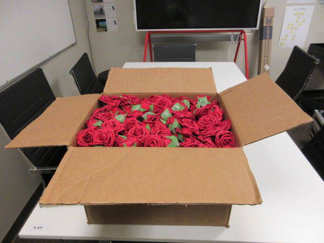 Box of Paper Roses (In Guest Experience Office by Spa) Auction