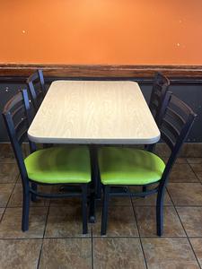 Commercial Dining Table and (4) Dining Chairs with Green Upholstered Cushioned Seats