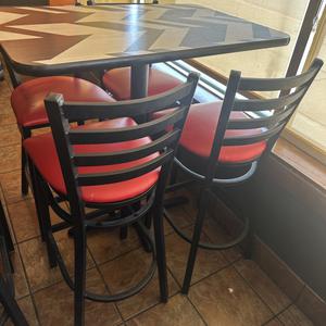 Commercial High Top Dining Table with Chevron Pattern Top and (4) Dining Bar Stools with Red Upholstered Cushioned Seats