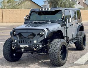 2013 Jeep Wrangler 4 Door SUV Reserve- - Sold at AuctionAZ for $18,000