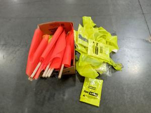 Group of Peer Basics Safety Vests and Orange Flags 