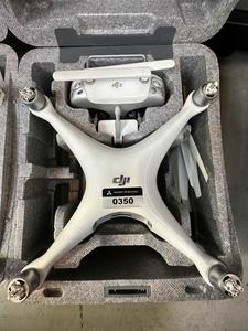 DJI Phantom-4 Drone with Remote Control, Charger and Case 