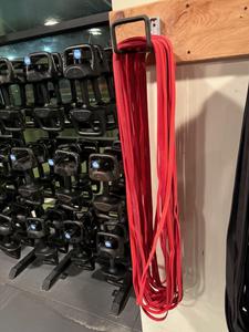 Group of Red Resistance Bands with Wall Bracket