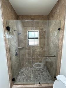 Left-Swing Glass Shower Door with Oil Rubbed Bronze Shower Hardware 