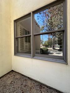 (2) Aluminum Framed Slide-Up Windows