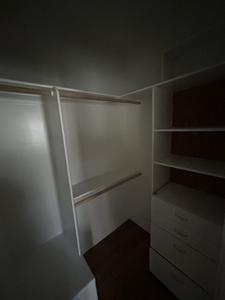 Complete Closet System with Rods, Drawers and Shelving 