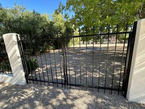 Swinging Iron Gate 