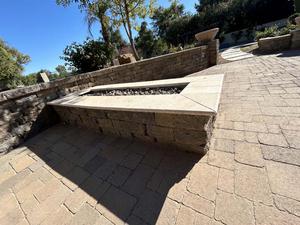 Brick Enclosed Outdoor Gas Firepit with Granite Tile Top
