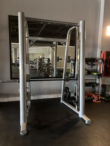 Smith Machine with Barbell Weight Holders - Sold at The Auction Yard for $810